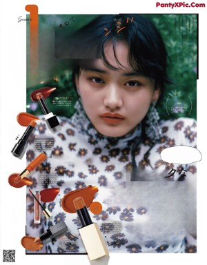 A magazine page with a picture of a woman holding a lipstick.