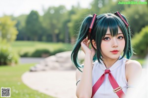 A woman with long green hair wearing headphones.